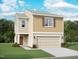 Charming two-story home featuring neutral siding, a two-car garage, and a well-maintained lawn at 1164 Solace Way, Rolesville, NC 27571