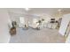 Spacious living room with plush seating, an open floor plan, and ample natural light at 1164 Solace Way, Rolesville, NC 27571