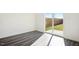 Bright room with sliding glass doors leading to the backyard and patio at 1164 Solace Way, Rolesville, NC 27571