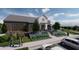 Beautiful clubhouse entrance with inviting walkway and elegant architectural details at 1169 Solace Way, Rolesville, NC 27571