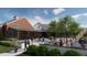 Community clubhouse featuring an outdoor patio with a seating and dining area at 1169 Solace Way, Rolesville, NC 27571