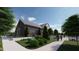 A community clubhouse with manicured lawn, green landscaping and elegant architectural lines at 1169 Solace Way, Rolesville, NC 27571