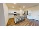 Spacious kitchen with granite countertops, stainless steel appliances, and a kitchen island at 1169 Solace Way, Rolesville, NC 27571
