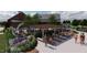Outdoor community lounge area featuring a grilling area, poolside lounge, and lush landscaping at 1169 Solace Way, Rolesville, NC 27571