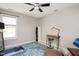 Bedroom featuring a desk area, ceiling fan, and a bright window at 118 Benedum Pl, Cary, NC 27518