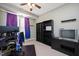 Bedroom with carpet and desk, featuring shelves for storage and organization at 118 Benedum Pl, Cary, NC 27518