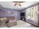 Cozy living room with a large window and a comfortable sectional couch at 118 Benedum Pl, Cary, NC 27518