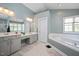 Bright main bathroom features a soaking tub and double sink vanity with ample counter space at 118 Benedum Pl, Cary, NC 27518