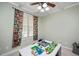 Bright playroom with colorful accents, ample space for activities, and a ceiling fan at 118 Benedum Pl, Cary, NC 27518