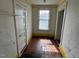 Bright attic space offering natural light, hardwood floors, and ample storage with closet at 121 W Young Ave, Henderson, NC 27536