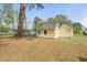 Landscaped backyard and cozy exterior elevation with great curb appeal at 1306 Ed Cook Rd, Durham, NC 27703