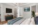 Bedroom boasts hardwood floors, en-suite access, and recessed lighting at 1306 Ed Cook Rd, Durham, NC 27703
