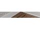 Close-up of new wood-look flooring at 1306 Ed Cook Rd, Durham, NC 27703