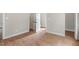 Hallway with hardwood floors and white trim at 1306 Ed Cook Rd, Durham, NC 27703