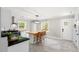 Bright eat-in kitchen with granite countertops, island with seating, and modern stainless appliances at 1306 Ed Cook Rd, Durham, NC 27703