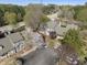 Aerial view of townhouses, landscaping, and parking at 1426 Quarter Pt, Raleigh, NC 27615