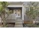 View of back porch with double doors and gray siding at 1426 Quarter Pt, Raleigh, NC 27615