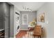 Cozy dining area features a modern track lighting, a laundry, and a wicker chair at 1426 Quarter Pt, Raleigh, NC 27615