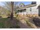 Charming two-story home with brick walkway and covered front porch at 1426 Quarter Pt, Raleigh, NC 27615