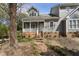 Charming two-story home with brick walkway and covered front porch at 1426 Quarter Pt, Raleigh, NC 27615