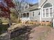 Charming two-story home with brick walkway and covered front porch at 1426 Quarter Pt, Raleigh, NC 27615