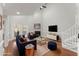 Decorated living room with vaulted ceiling, fireplace, sofa, chairs, and entertainment center at 1426 Quarter Pt, Raleigh, NC 27615