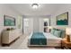 Relaxing bedroom with plush rug, stylish dresser, closet space, and bright natural light at 1426 Quarter Pt, Raleigh, NC 27615