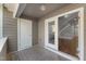 Covered outdoor patio leading to indoor living area at 1426 Quarter Pt, Raleigh, NC 27615