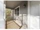 Charming covered front porch with gray siding and white trim at 1426 Quarter Pt, Raleigh, NC 27615