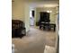 Open concept dining area adjacent to the kitchen and living room at 144 Gremar Dr, Holly Springs, NC 27540