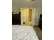 Spacious bedroom with a view into the attached primary bathroom at 144 Gremar Dr, Holly Springs, NC 27540