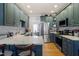 Bright eat-in kitchen with stainless steel appliances and shaker style cabinets at 15 Longwood Dr, Youngsville, NC 27596