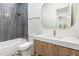 Chic bathroom features brass hardware, tiled shower and decorative tile flooring at 1621 Bruce Circle, Raleigh, NC 27604