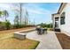 Outdoor patio with dining and a built-in grill, perfect for entertaining guests in the backyard at 1629 Montvale Grant Way, Cary, NC 27519