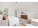 Cozy bedroom with a ceiling fan, a decorative rug, and two chairs at 1629 Montvale Grant Way, Cary, NC 27519