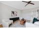 Comfortable living room featuring a stylish sofa, accent chairs, and natural light at 1629 Montvale Grant Way, Cary, NC 27519