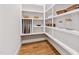 Organized pantry with ample shelving, providing plenty of storage space for all your kitchen essentials at 1629 Montvale Grant Way, Cary, NC 27519