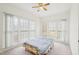 Bright bedroom with three windows and a comfortable bed at 1903 Yellowwood Ln, Durham, NC 27712