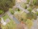 Aerial shot of a home situated on a corner lot with mature trees and street access from multiple directions at 201 E End Ave, Durham, NC 27703