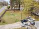 Aerial view of the large backyard with shed, outbuilding, and multiple parking spaces at 201 E End Ave, Durham, NC 27703