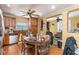 A kitchen featuring wooden cabinets, hardwood floors, and a ceiling fan at 201 E End Ave, Durham, NC 27703