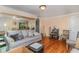 Cozy living room featuring a comfortable sofa and ample space for relaxation at 201 E End Ave, Durham, NC 27703