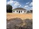 New construction home with white siding and a spacious backyard at 21 Mildred Pl, Broadway, NC 27505