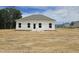 A new house with a large, unfinished backyard at 21 Mildred Pl, Broadway, NC 27505