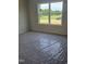 Bedroom featuring a large window offering natural light and exterior view at 21 Mildred Pl, Broadway, NC 27505