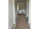 Bright hallway leading into rooms with beautiful decorative wall trim at 21 Mildred Pl, Broadway, NC 27505