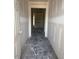 Bright hallway leading to other rooms with neutral walls and floors, ready for personalization at 21 Mildred Pl, Broadway, NC 27505