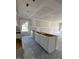 Open-concept kitchen featuring neutral walls and floors and plenty of natural light, ready for personalization at 21 Mildred Pl, Broadway, NC 27505