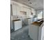 Bright kitchen featuring white cabinets and natural light through a window at 21 Mildred Pl, Broadway, NC 27505