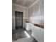 Kitchen showcasing white cabinets and unfinished walls for a modern design at 21 Mildred Pl, Broadway, NC 27505